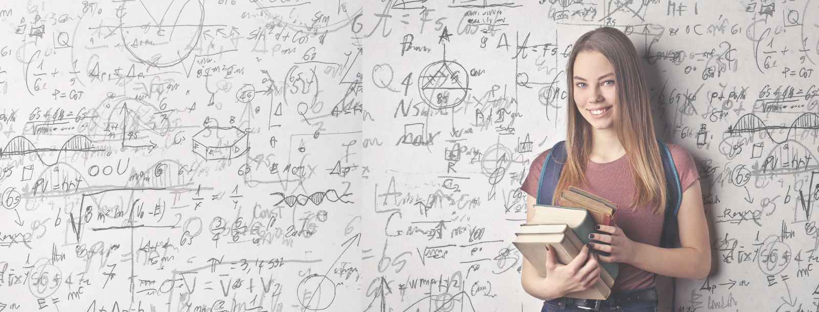 Student loan hero photo - girl with books 